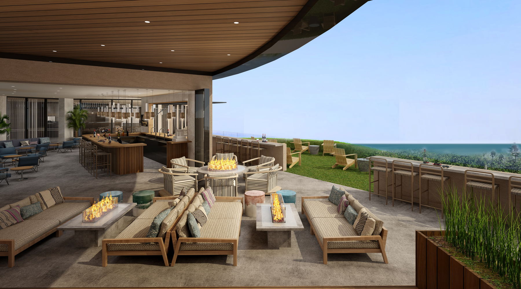 The Pocket bar and terrace with fire tables, low sofas and Adirondack chairs on the lawn facing the ocean